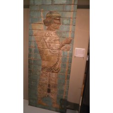 Glazed brick guardsman on the east gate of palace, cross